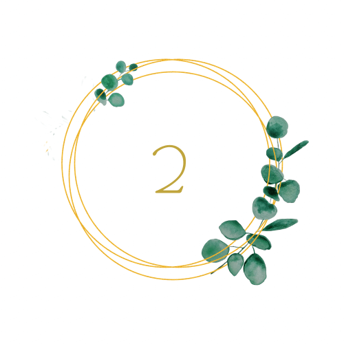 Golden hoops overlaid with sprigs of eucalyptus with a number 2 in the middle