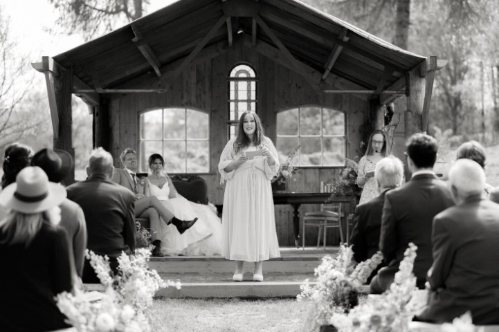Friends of the couple make great readers. Hannah stands in front of the Love Shack at Oak Tree Barn. Amy Sanders captured her mid flow.